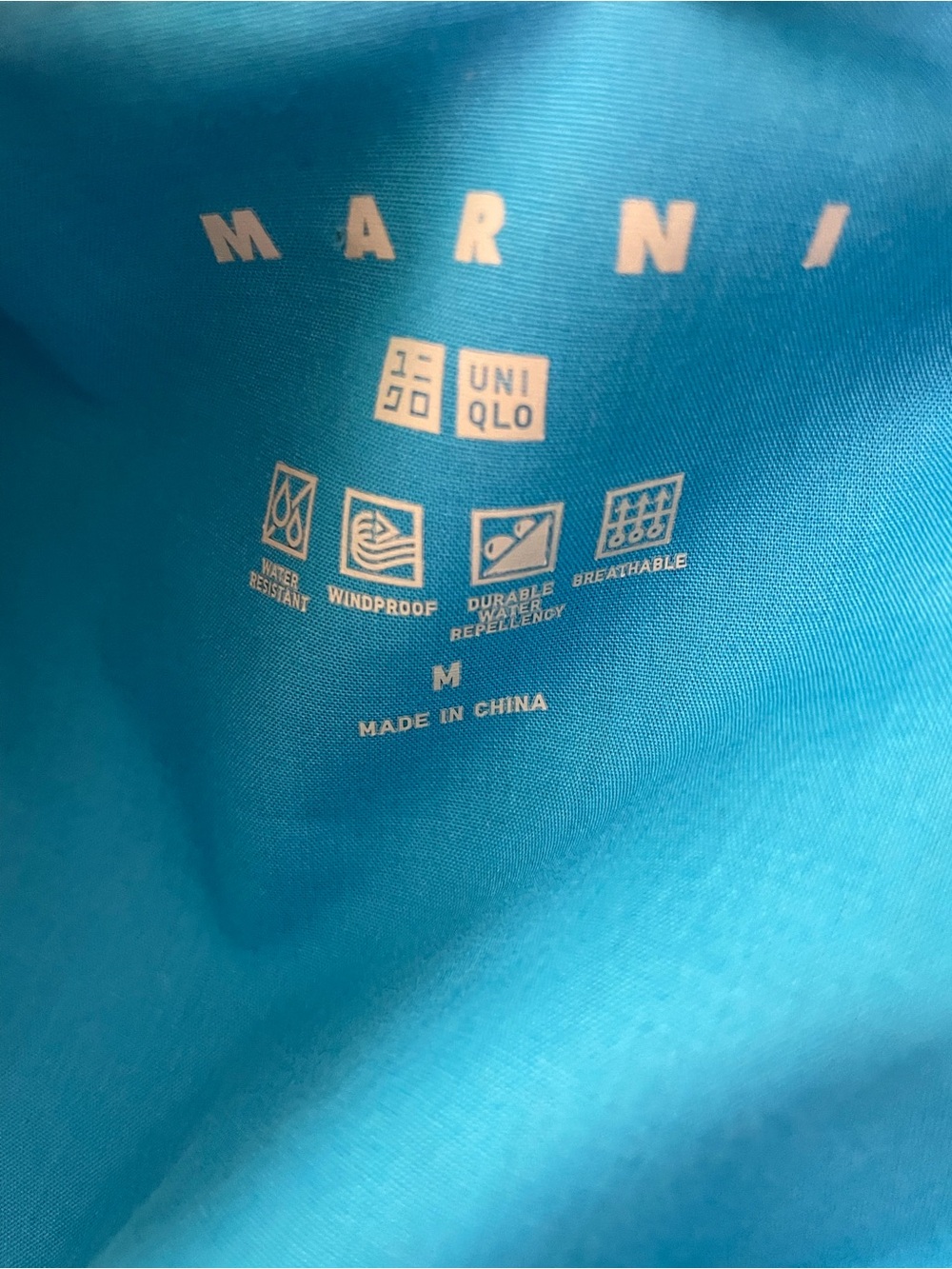 Uniqlo x Marni Blue Hooded
Raincoat Medium Waterproof Medium - Picture 3 of 3